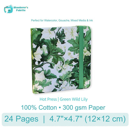 Notebook with floral design and green binding on a white background