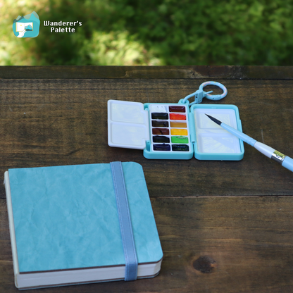 	Pos 2: 12 Holbein watercolor pans close-up in mini travel palette