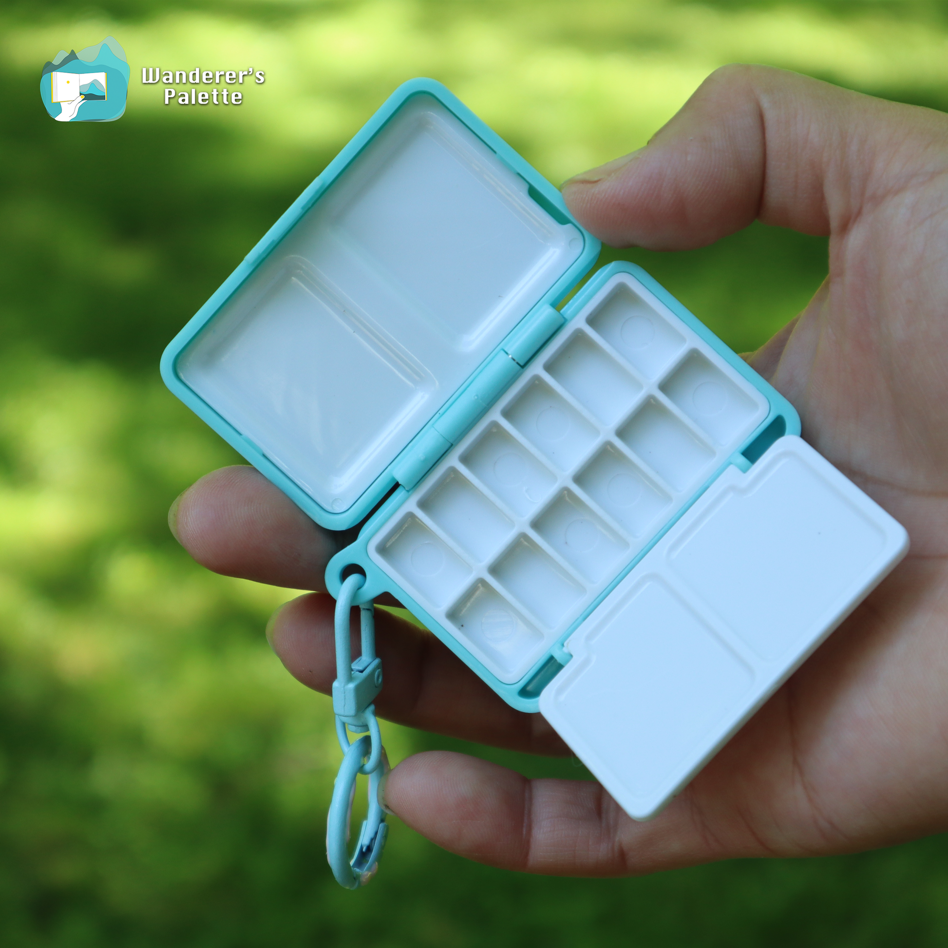 	Pos 3: Artist painting with mini watercolor palette - travel art kit
