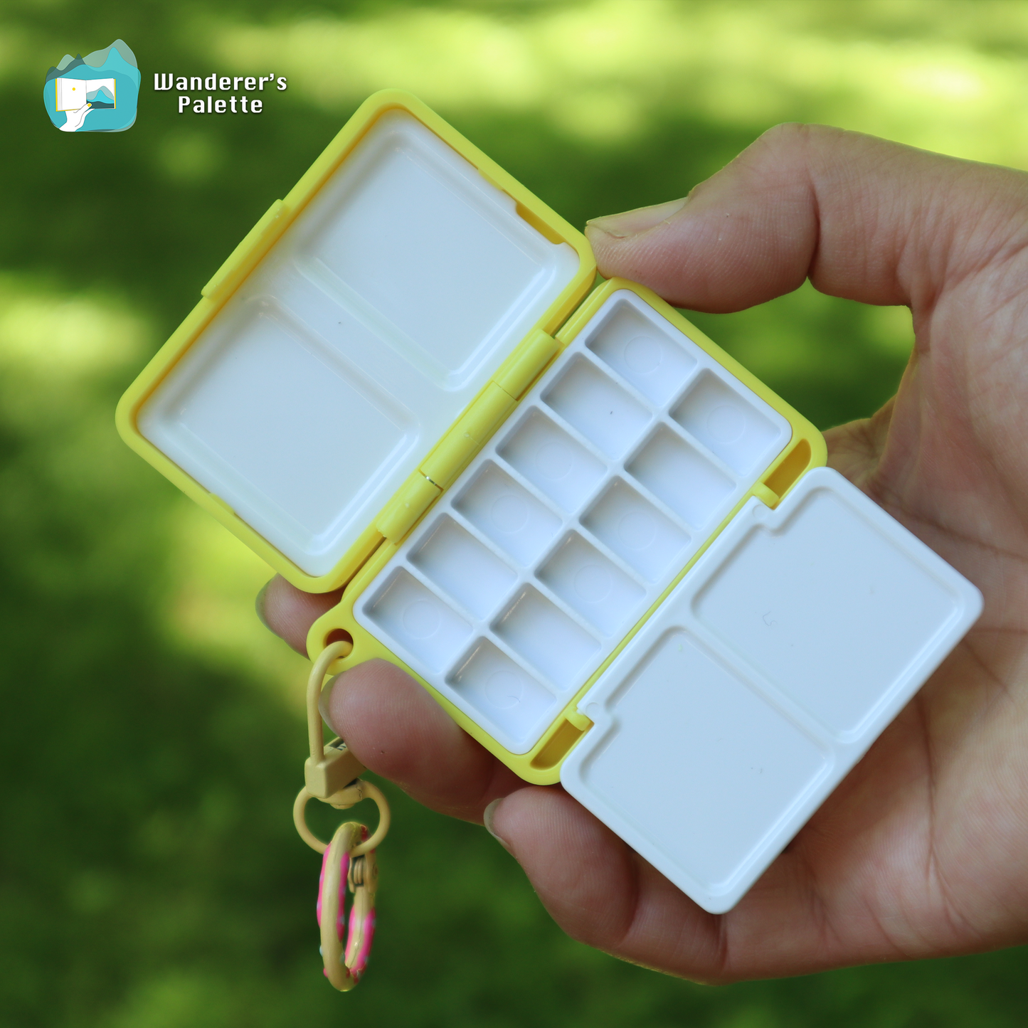 	Pos 8: Mini watercolor palette in hand - travel art kit