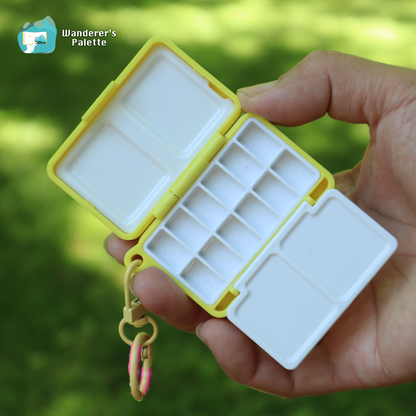 	Pos 8: Mini watercolor palette in hand - travel art kit