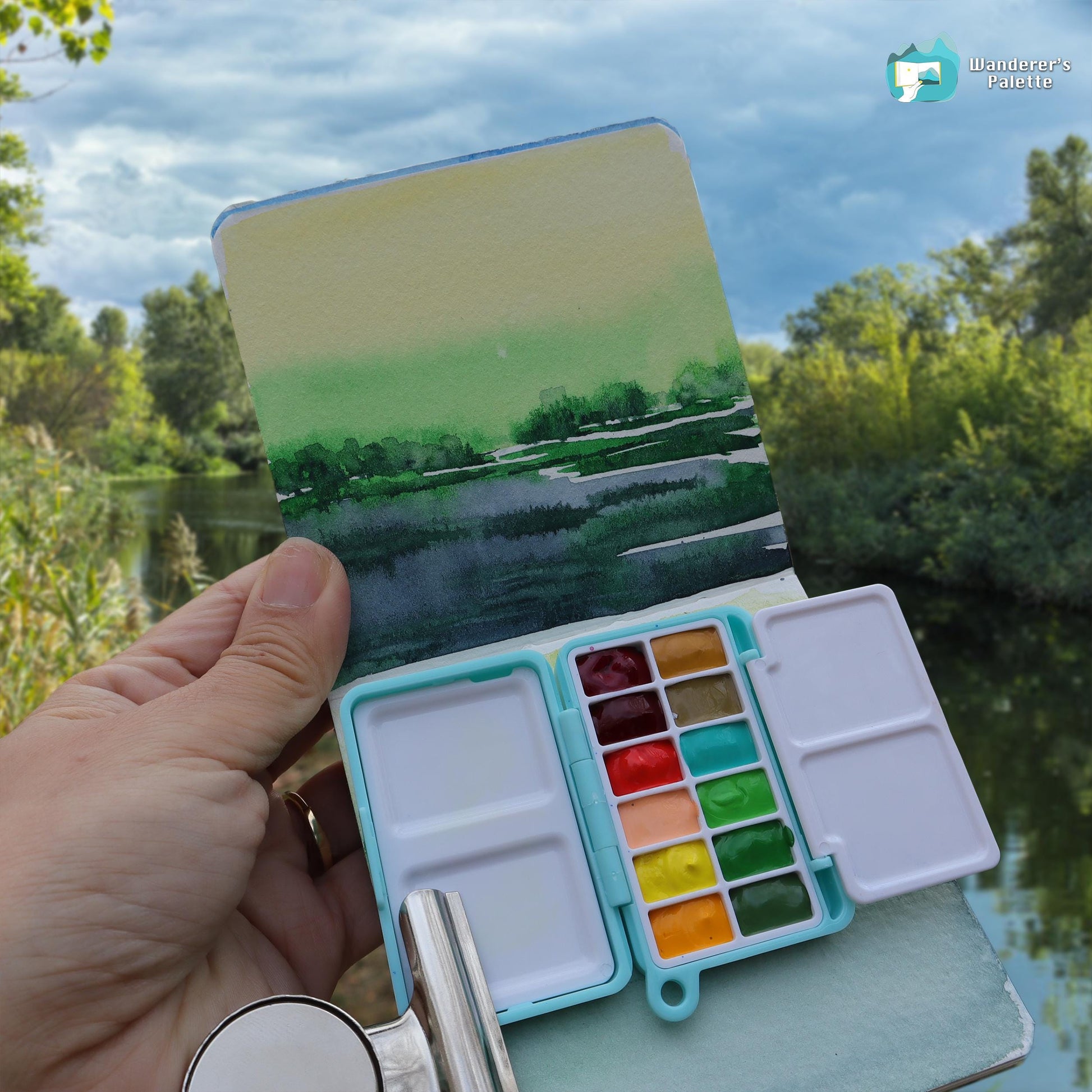 	Pos 3: Artist painting with mini watercolor palette - travel art kit