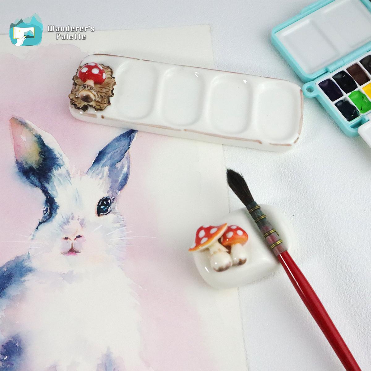 Pos 5: Ceramic mushroom brush stand in use on artist desk