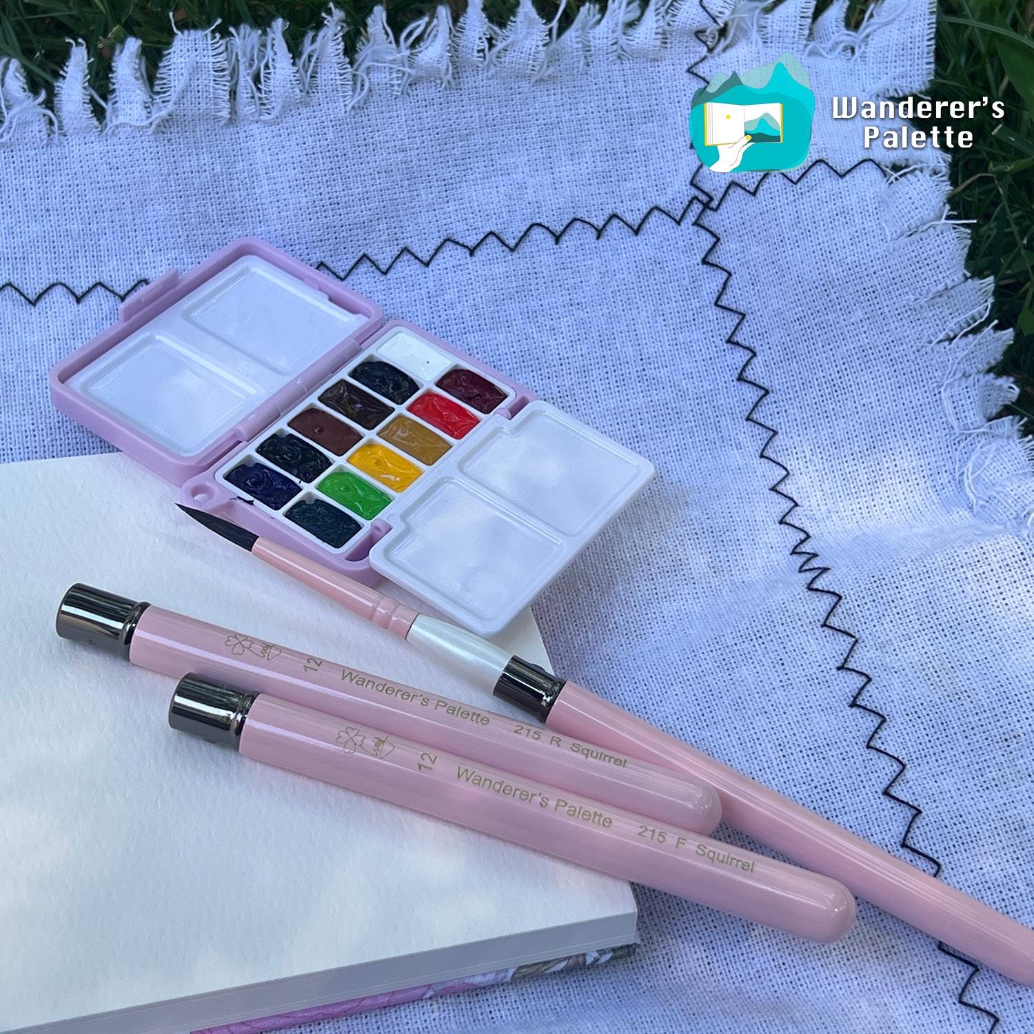 	Pos 2: Squirrel mix hair bristles close-up - pink collapsible brush