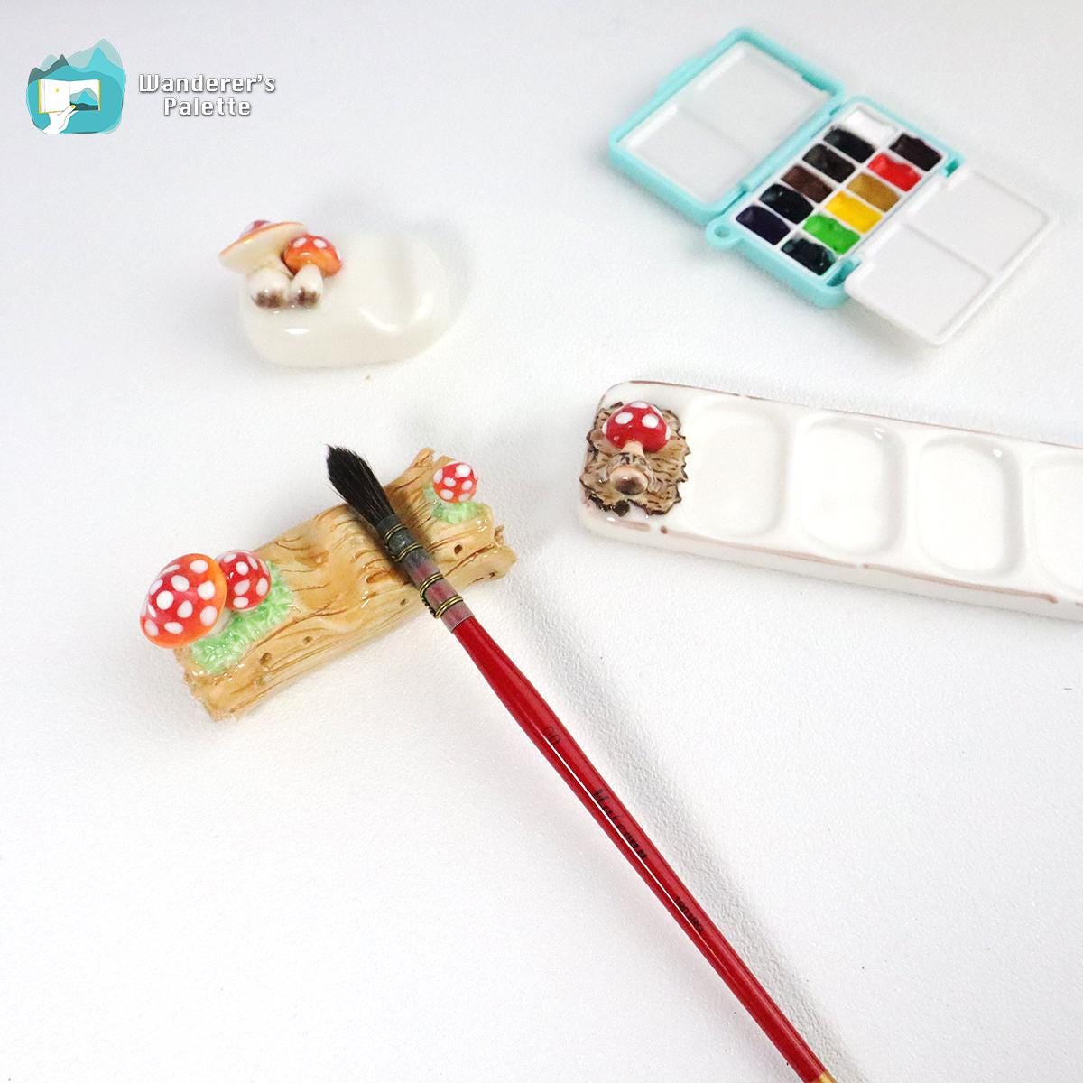 Pos 1: Handmade mushroom ceramic brush rest - paint brush holder watercolor brush stand artist gift