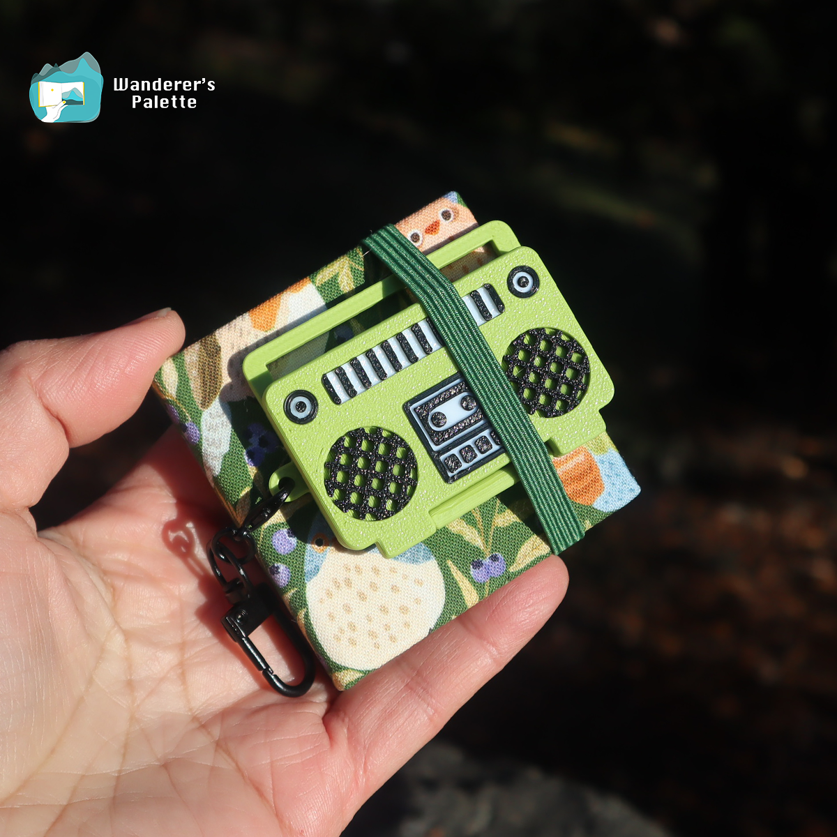 	Pos 5: Ceramic mixing surface detail - retro boombox watercolor palette