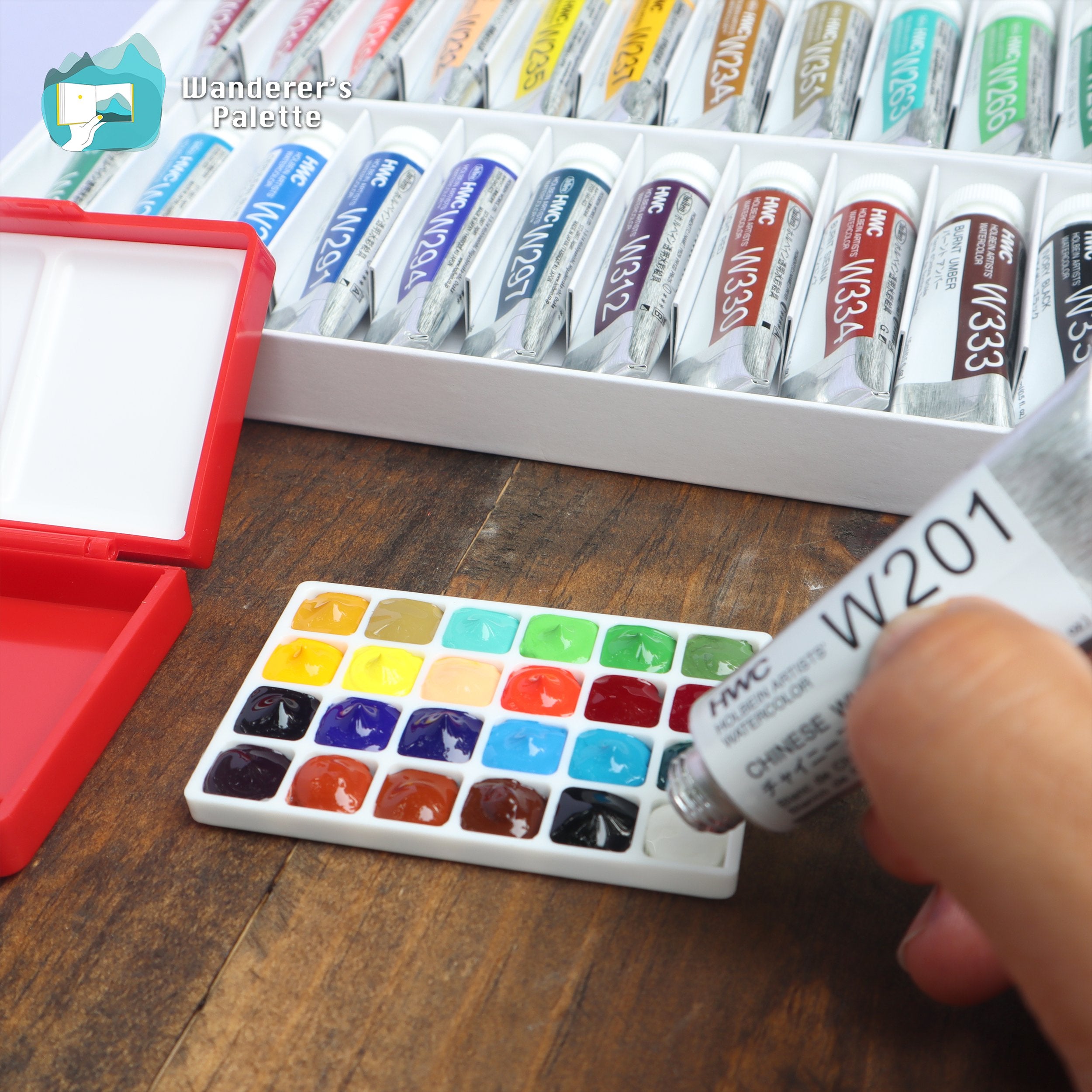 Filling clean palette wells directly from Holbein watercolor tubes