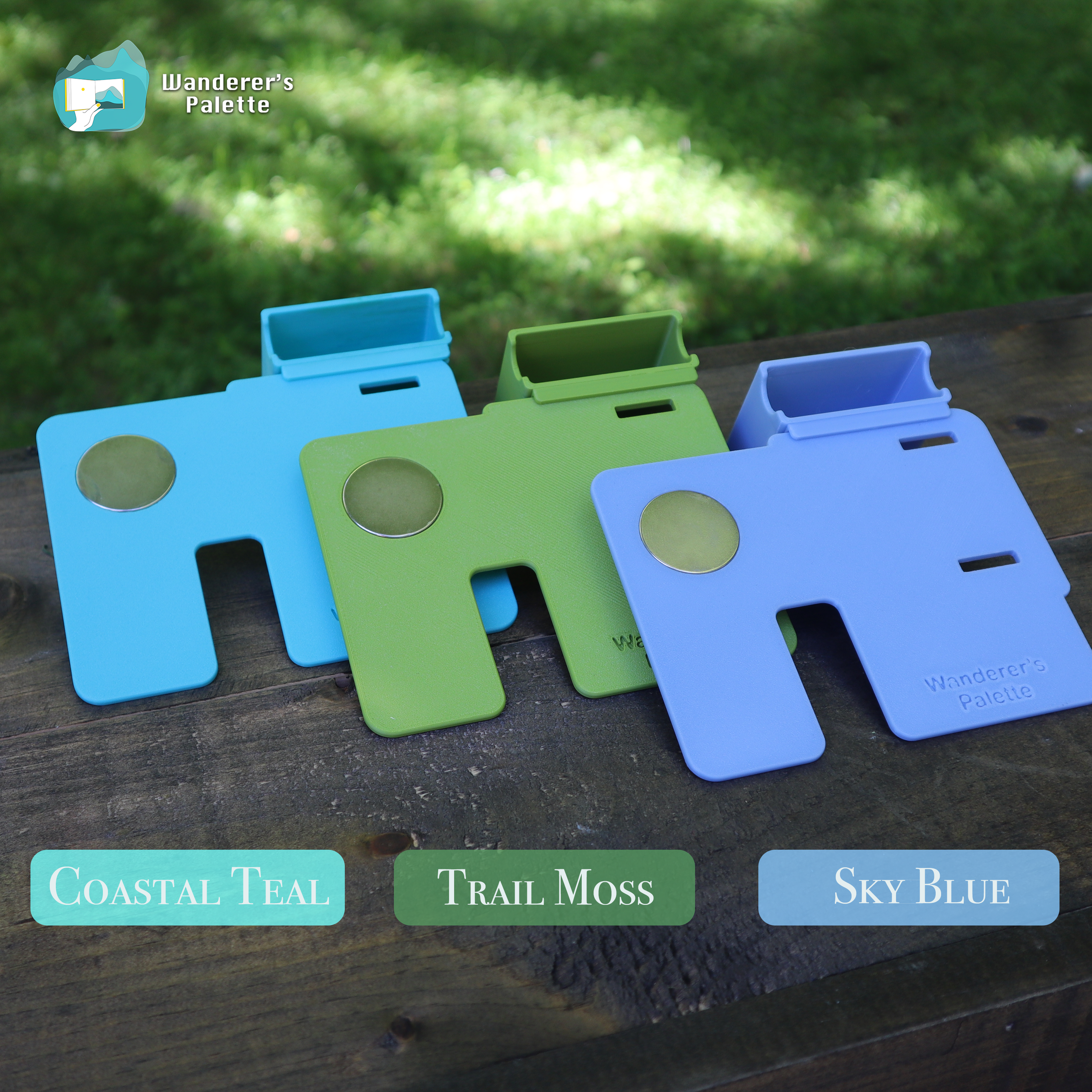 Personalized Plein Air Watercolor Board ｜ Palette Adapter | Choose Your Color & Custom Text ｜ Gift for Artist A color options chart for a nature-inspired  , showing 12 different color variants labeled with names like Sky, Lagoon, Olive, Teal, Pine, Moss, Lavender, Iris, Peony, Dune, Sunflower, and Slate. 